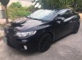 Kia Forte Koup 2010 - Mình bán xe Kia Forte Koup 2010 tự động, hai cửa, màu đen, xe cực chất