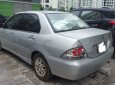 Mitsubishi Lancer   1.6 AT  2004 - Cần bán xe Mitsubishi Lancer 1.6 AT năm sản xuất 2004, màu bạc giá cạnh tranh