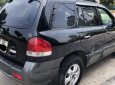 Hyundai Santa Fe   2.0 AT  2005 - Bán Hyundai Santa Fe 2.0 AT 2005, màu đen chính chủ, giá tốt