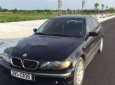 BMW 3 Series 318i 2002 - Bán xe BMW 3 Series 318i đời 2002, màu đen, xe nhập