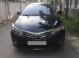 Toyota Corolla altis  G 2014 - Bán Toyota Corolla Altis G đời 2015 số sàn, màu đen