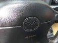 Mazda 323   1999 - Bán ô tô Mazda 323 năm 1999, màu đen giá rẻ