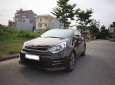 Kia Rio 1.4 GAT 2016 - Bán Kia Rio Hatchback 2016 tự động, màu nâu, xe zin nguyên bản đẹp