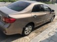 Toyota Corolla altis 2010 - Bán ô tô Toyota Corolla Altis đời 2010, màu nâu, 415tr