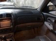 Mazda 323 2004 - Gia đình bán Mazda 323 2004, màu đen, 150tr