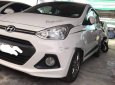 Hyundai i10 2015 - Cần bán gấp Hyundai i10 năm 2015, màu trắng, giá 262tr