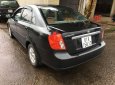 Chevrolet Lacetti 2005 - Cần bán gấp Chevrolet Lacetti 2005, màu đen xe gia đình, giá chỉ 157 triệu