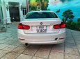 BMW 3 Series 320i 2012 - Bán xe BMW 320i màu trắng camay 2013 - 839 triệu