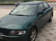 Mazda 323 G 2000 - Cần bán xe Mazda 323 G 2000, màu xanh lá, giá 92 tr