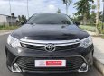 Toyota Camry E 2015 - Bán Toyota Camry 2.0E 2015 chạy lướt, màu đen, giá chỉ 890 triệu