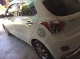 Hyundai Grand i10   MT 2014 - Gia đình bán Hyundai Grand phiên bản cao cấp, Sx 2014, lăn bánh 4-2015