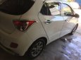 Hyundai Grand i10   MT 2014 - Gia đình bán Hyundai Grand phiên bản cao cấp, Sx 2014, lăn bánh 4-2015