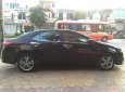 Toyota Corolla altis  1.8 G  2015 - Bán Toyota Corolla altis 1.8 G năm 2015, màu đen số tự động, giá tốt