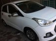 Hyundai Grand i10   MT 2014 - Gia đình bán Hyundai Grand phiên bản cao cấp, Sx 2014, lăn bánh 4-2015