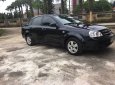 Daewoo Lacetti  MT 2011 - Cần bán lại xe Daewoo Lacetti MT năm 2011, màu đen