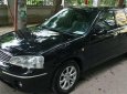 Ford Laser 1.6 2004 - Cần bán lại xe Ford Laser 1.6 sản xuất 2004, màu đen, 156tr