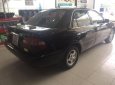 Toyota Corolla 2000 - Cần bán gấp Toyota Corolla đời 2000, màu đen