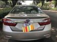 Toyota Camry 2.0 E  2013 - Cần bán xe Toyota Camry 2.0 E đời 2013, màu nâu, giá tốt