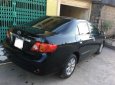 Toyota Corolla altis 1.8G MT 2009 - Cần bán gấp Toyota Corolla altis 1.8G MT đời 2009, màu đen 