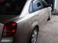 Daewoo Lacetti 2004 - Bán xe Daewoo Lacetti năm sản xuất 2004, màu vàng, giá 155 triệu