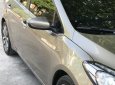 Kia K3 2.0 2014 - Bán xe Kia K3 2.0 năm 2014, màu vàng