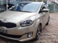 Kia Rondo AT 2015 - Cần bán Kia Rondo AT sản xuất năm 2015, màu vàng, 620tr