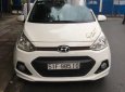 Hyundai Grand i10   MT 2016 - Cần bán Hyundai Grand i10 MT năm 2016, màu trắng, bản đủ