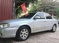 Kia Spectra    2003 - Cần bán xe Kia Spectra 2003, màu bạc giá cạnh tranh