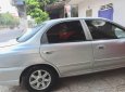 Kia Spectra    2003 - Cần bán xe Kia Spectra 2003, màu bạc giá cạnh tranh