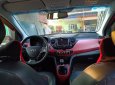 Hyundai Grand i10 2015 - Cần bán gấp Hyundai Grand i10 năm sản xuất 2015, màu đỏ, nhập khẩu số sàn