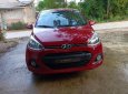 Hyundai Grand i10 2015 - Cần bán gấp Hyundai Grand i10 năm sản xuất 2015, màu đỏ, nhập khẩu số sàn