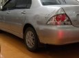 Mitsubishi Lancer 2004 - Bán Mitsubishi Lancer 2004, màu bạc số tự động, giá 250tr