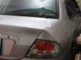 Mitsubishi Lancer 2004 - Bán Mitsubishi Lancer 2004, màu bạc số tự động, giá 250tr