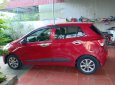 Hyundai Grand i10 2015 - Cần bán gấp Hyundai Grand i10 năm sản xuất 2015, màu đỏ, nhập khẩu số sàn