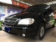 Kia Carnival GS 2007 - Bán Kia Carnival GS đời 2007, màu đen chính chủ