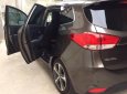 Kia Rondo   2.0GAT 2015 - Chính chủ bán Kia Rondo 2.0GAT sản xuất 2015, màu nâu