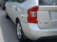 Kia Carens SX 2.0 AT 2009 - Cần bán gấp Kia Carens SX 2.0 AT năm sản xuất 2009, màu bạc 