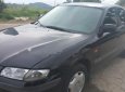 Mazda 626 2001 - Cần bán lại xe Mazda 626 năm sản xuất 2001, màu đen