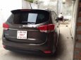 Kia Rondo GAT 2015 - Bán ô tô Kia Rondo GAT đời 2015, màu nâu giá cạnh tranh