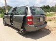 Kia Carnival 2010 - Bán Kia Carnival năm sản xuất 2010, màu xám, nhập khẩu  