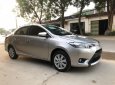 Toyota Vios  E 1.5MT  2014 - Bán Toyota Vios E số sàn năm sản xuất 2014, màu vàng