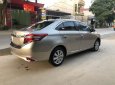 Toyota Vios  E 1.5MT  2014 - Bán Toyota Vios E số sàn năm sản xuất 2014, màu vàng