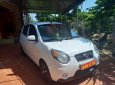 Kia Morning LX 1.0 MT 2010 - Cần bán Kia Morning LX 1.0 MT đời 2010, màu trắng, nhập khẩu nguyên chiếc số sàn