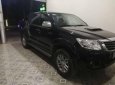 Toyota Hilux  2.5E 2014 - Bán ô tô Toyota Hilux 2.5E năm sản xuất 2014, màu đen, xe nhập Thái Lan