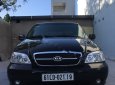 Kia Carnival GS 2005 - Bán xe Kia Carnival GS năm 2005, màu đen, giá 219tr