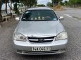 Daewoo Lacetti 2009 - Bán Daewoo Lacetti sản xuất 2009, màu bạc xe gia đình 