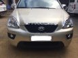 Kia Carens 2.0MT 2012 - Bán xe Kia Carens 2.0MT sản xuất năm 2012, màu vàng còn mới, giá tốt