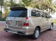 Toyota Innova MT 2013 - Gia đình cần bán Innova 2013, số sàn, màu vàng cát, còn đẹp như mới