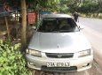 Mazda 323 2001 - Cần bán xe Mazda 323 đời 2001, màu bạc 