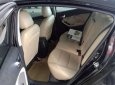 Kia Cerato 2.0AT 2016 - Cần bán lại xe Kia Cerato 2.0AT sản xuất 2016, màu đen 
